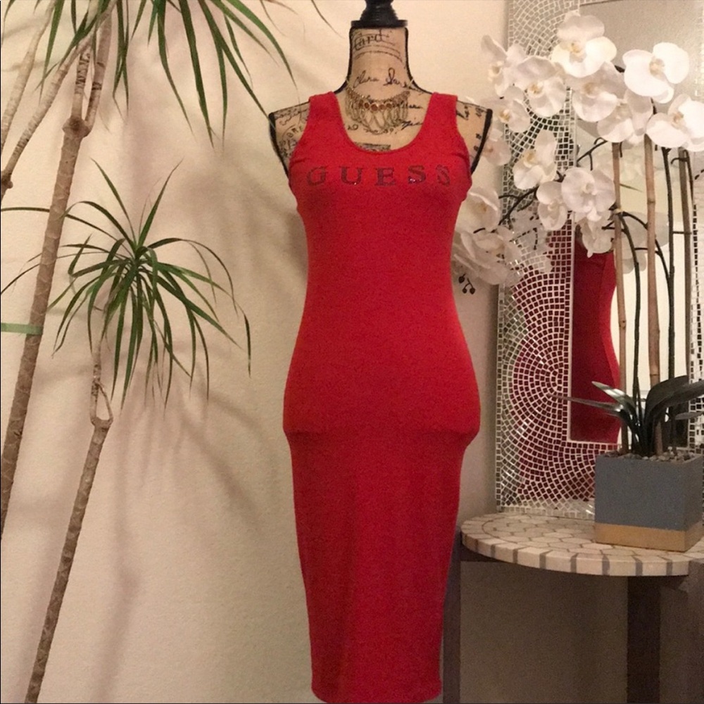 NWOT Guess Dress Red NWOT
With black lettering . No tears
No Rips